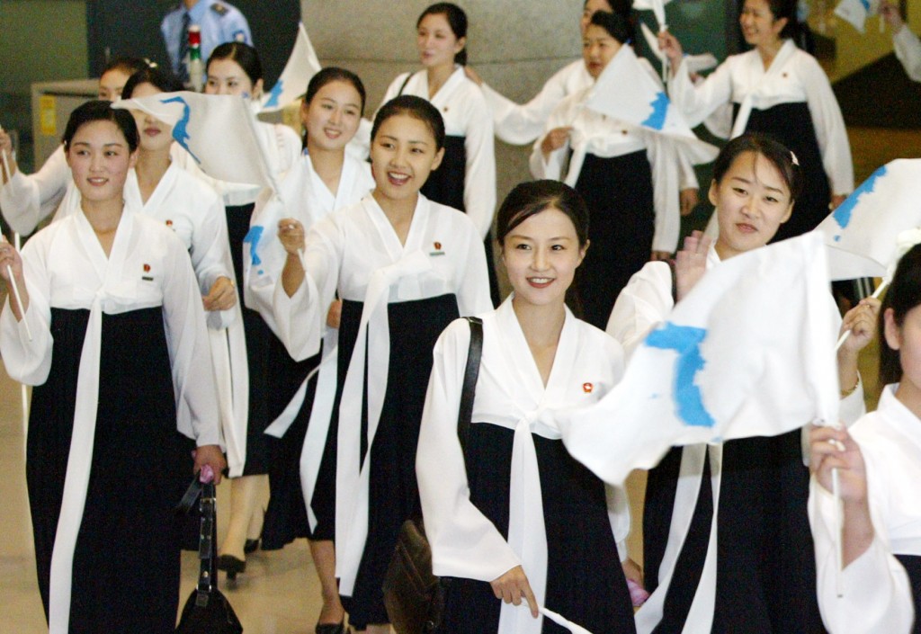 A squad of North Korean cheerleaders arrive at Incheon International Airport on Aug. 31, 2005, to attend the 16th Asian Athletics Championships in Incheon. North Korea said on July 7, 2014, it will dispatch a cheerleading contingent to the Incheon Asian Games in September along with its athletes to help improve inter-Korean relations and to show Pyongyang's commitment to unification. (Yonhap)