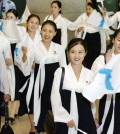 A squad of North Korean cheerleaders arrive at Incheon International Airport on Aug. 31, 2005, to attend the 16th Asian Athletics Championships in Incheon. North Korea said on July 7, 2014, it will dispatch a cheerleading contingent to the Incheon Asian Games in September along with its athletes to help improve inter-Korean relations and to show Pyongyang's commitment to unification. (Yonhap)