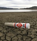 A warning buoy sits on the dry, cracked bed of Lake Mendocino near Ukiah, Calif.  (AP / Rich Pedroncelli)