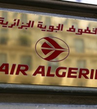 The logo of the Air Algerie company office, at the Opera avenue in Paris Thursday July 24, 2014. A flight operated by Air Algerie has disappeared from radar while traveling from Burkina Faso in West Africa to Algiers. Authorities say it was carrying over 100 passengers and crew when air navigation services lost track of the Swiftair plane 50 minutes after takeoff earlier this morning. (AP Photo/Remy de la Mauviniere)