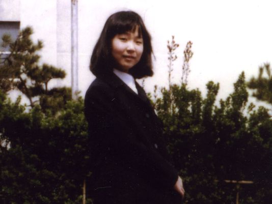 In this photo taken in 1977 and released by National Association for the Rescue of Japanese Kidnapped by North Korea, Megumi Yokota, 13, stands in front of Yorii Junior High School in Niigata, northwestern Japan, before her abduction by North Korean agents. (Photo: AP Photo/National Association for the Rescue of Japanese Kidnapped by North Korea)