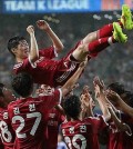 Teammates throw Park Ji-sung, a retiring South Korean football star, in air in celebration during the K League Classic All-Star Game in Seoul on July 25, 2014. (Yonhap)