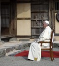 Pope Francis prays with Daejeon Bishop Lazarus You Heung-sik in front of the birthplace of Saint Andrea Kim Dae-gun at the Solmoe Sanctuary, South Korea, Friday, Aug. 15, 2014. (AP Photo/Gregorio Borgia)