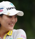 Ryu So-yeon of South Korea, smiles during a delay in action on the third hole during second round play at the Canadian Pacific Women's Open golf tournament in London, Ontario, Friday, Aug. 22, 2014. (AP Photo/The Canadian Press, Dave Chidley)