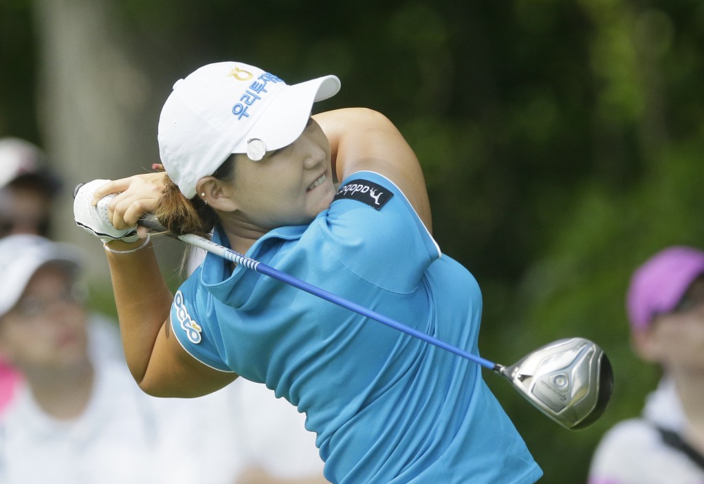 Mirim Lee of South Korea drives on the seventh hole during the final round of the Meijer LPGA Classic golf tournament at Blythefield Country Club, Sunday, Aug. 10, 2014, in Belmont, Mich. (AP Photo/Carlos Osorio)