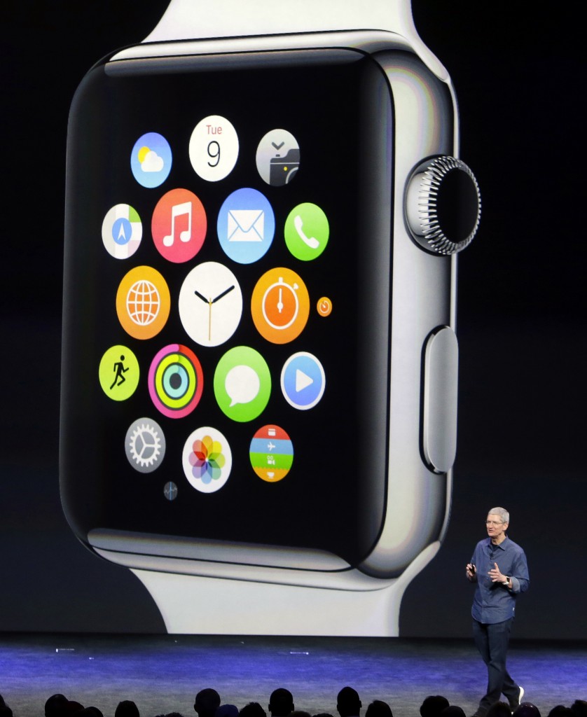 Apple CEO Tim Cook introduces the new Apple Watch on Tuesday, Sept. 9, 2014, in Cupertino, Calif. (AP Photo/Marcio Jose Sanchez)