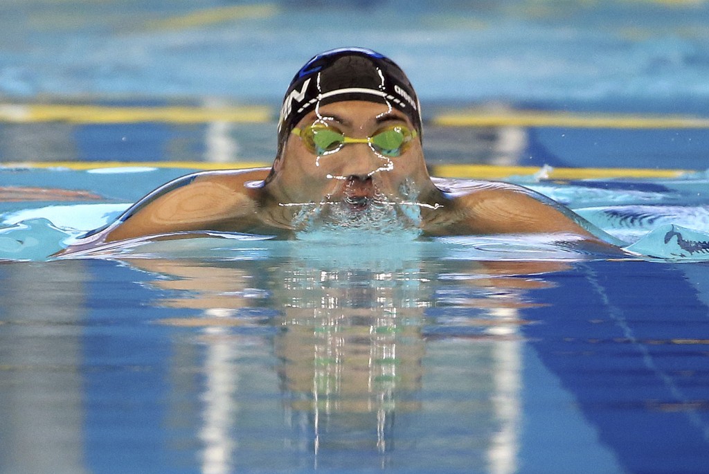 Japan's Naoya Tomita swims during his men's 50m breaststroke at the 17th Asian Games in Incheon, South Korea,  Friday, Sept. 26, 2014.(AP Photo/Rob Griffith)