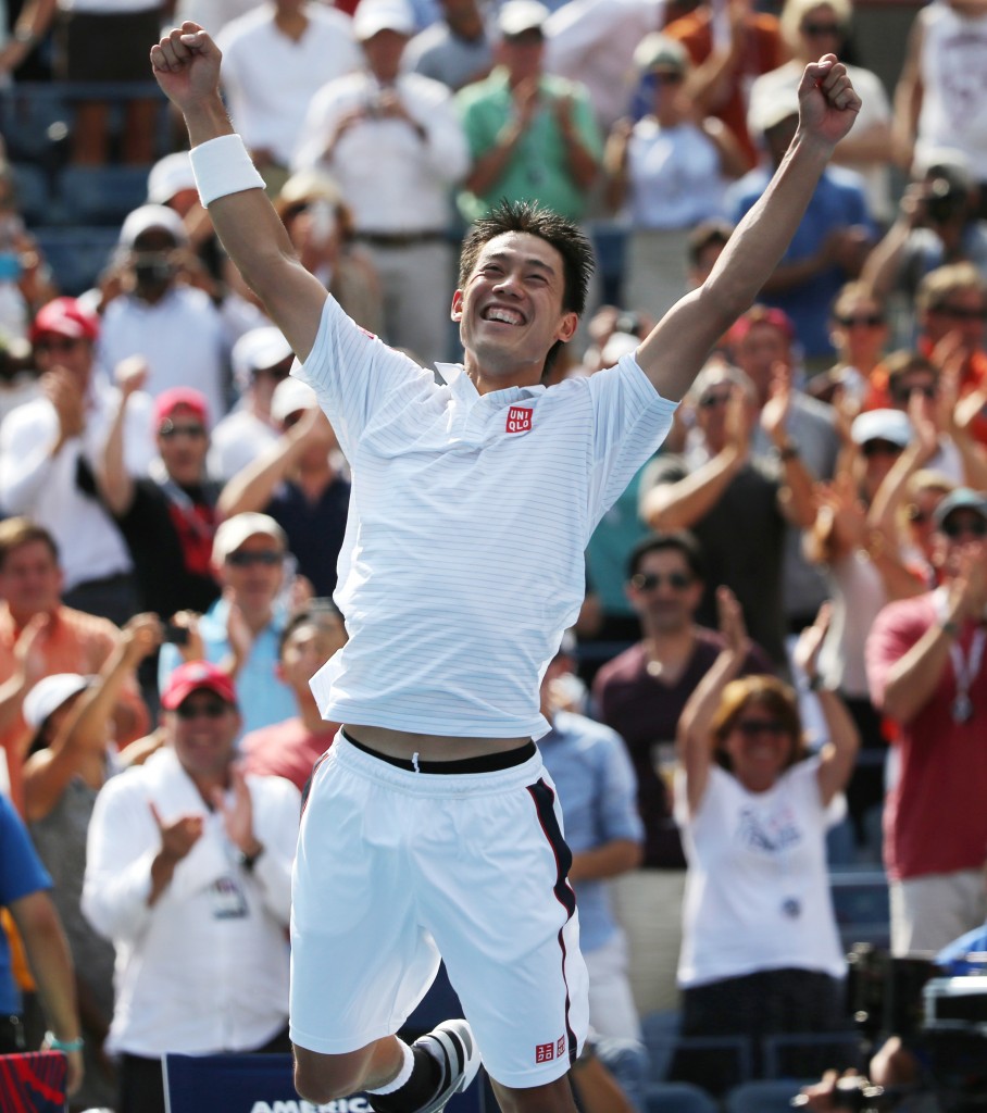 Kei Nishikori, of Japan, reacts after defeating Novak Djokovic, of Serbia, during the semifinals of the 2014 U.S. Open tennis tournament, Saturday, Sept. 6, 2014, in New York. (AP Photo/Mike Groll)