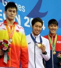 From left, silver medalist China's Sun Yang, gold Japan's Kosuke Hagino and bronze South Korea's Park Tae-hwan  pose for  photo on the podium after the men's 200-meter freestyle swimming final at the 17th Asian Games in Incheon, South Korea,  Sunday, Sept. 21, 2014.(AP Photo/Rob Griffith)