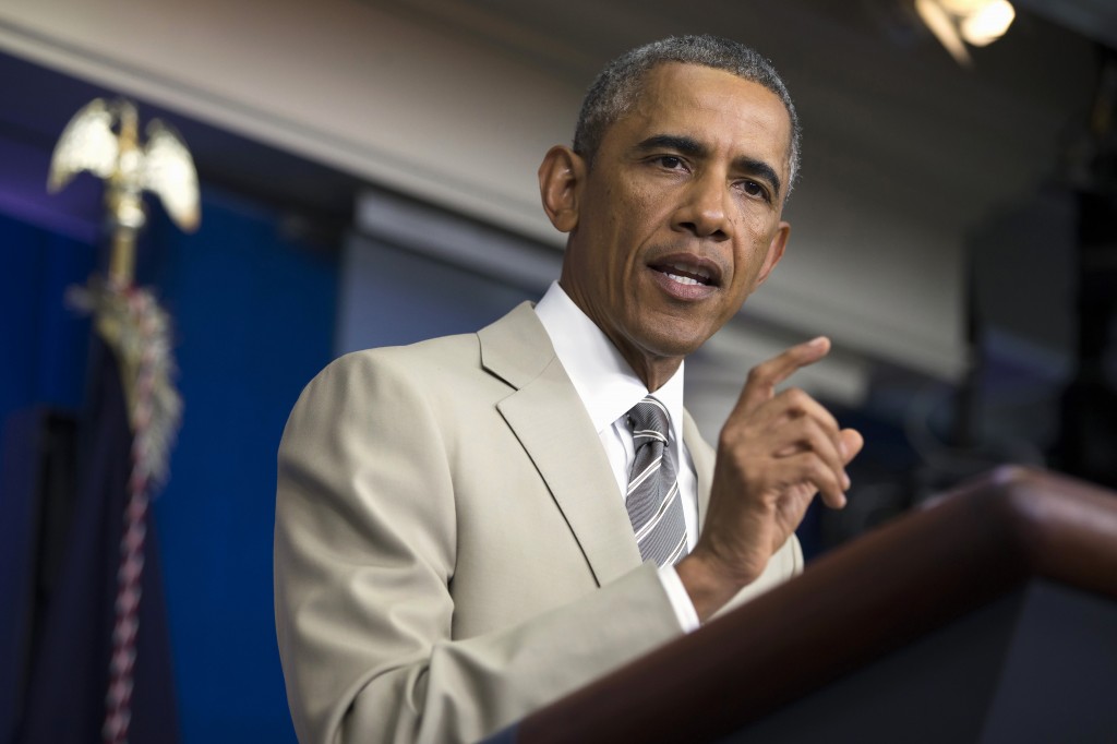 FILE - In this Aug. 28, 2014 file photo, President Barack Obama speaks in the James Brady Press Briefing Room of the White House in Washington, before convening a meeting with his national security team on the militant threat in Syria and Iraq. The U.S. and its allies are trying to hammer out a coalition to push back the Islamic State group in Iraq. But any serious attempt to destroy the militants or even seriously degrade their capabilities means targeting their infrastructure in Syria. That, however, is far more complicated. If it launches airstrikes against the group in Syria, the U.S. runs the risk of unintentionally strengthening the hand of President Bashar Assad, whose removal the West has actively sought the past three years. Uprooting the Islamic State, which has seized swaths of territory in both Syria and Iraq, would potentially open the way for the Syrian army to fill the vacuum. (AP Photo/Evan Vucci, File)