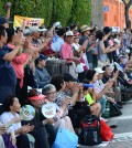 Spectators watch the Korean Parade Saturday in Los Angeles' Koreatown. (The Korea Times)