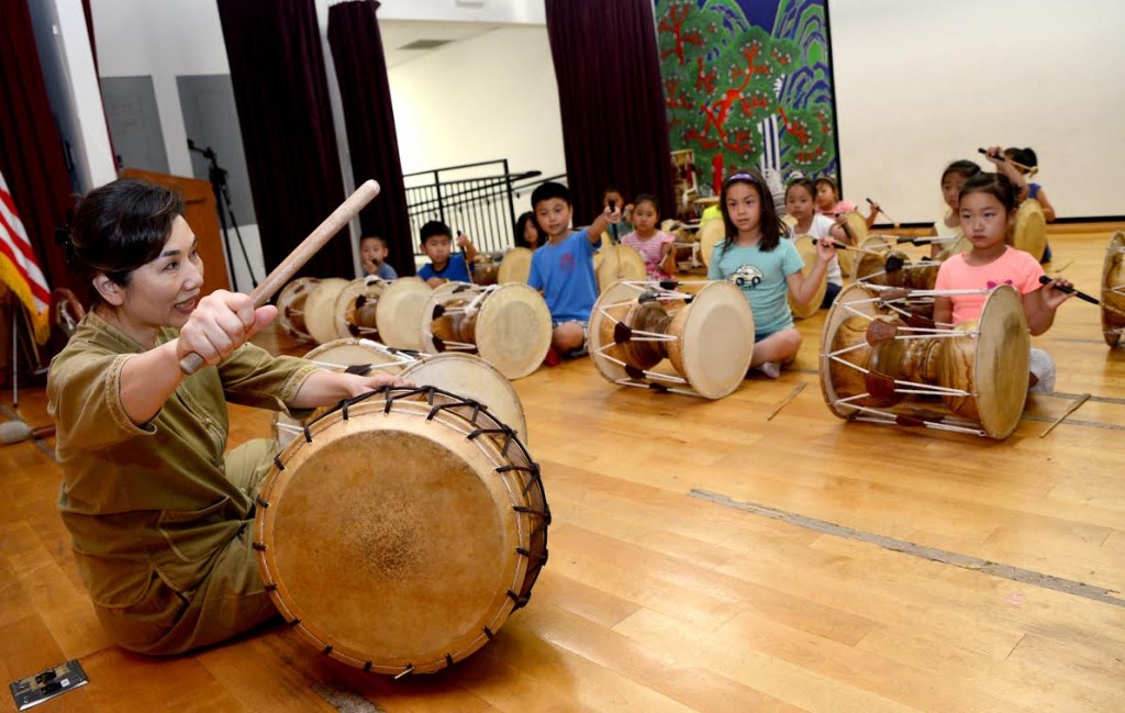 Students participate in a drum class at the KECLA on Aug. 30 for its fall heritage program. (Kim Young-jae/The Korea Times)