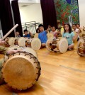 Students participate in a drum class at the KECLA on Aug. 30 for its fall heritage program. (Kim Young-jae/The Korea Times)