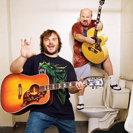 Jack Black, left, is the lead vocalist and guitarist in the group, whose lyrics are often humorous. Kyle Gass, sings and plays lead guitar.  