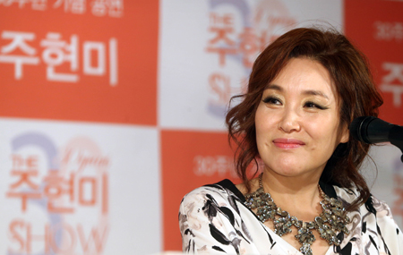 Joo Hyun-mi smiles during a press confernece in Seoul on Aug. 26. (Yonhap)