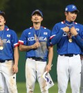 South Korean players had a good reason to look so relieved. (Yonhap)
