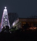 IN THIS PHOTO TAKEN ON TUESDAY, DEC. 21, 2010, A giant steel Christmas tree is lit at the western mountain peak known as Aegibong in Gimpo, South Korea. (AP Photo/Lee Jin-man)