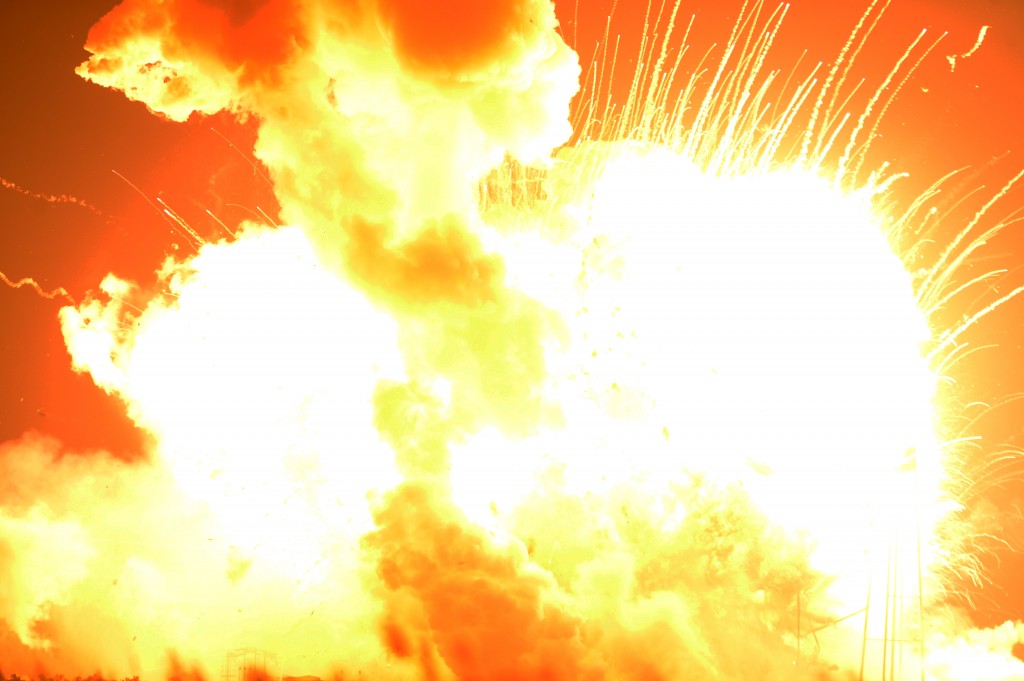 An unmanned Orbital Sciences Corp.'s Antares rocket explodes shortly after takeoff at Wallops Flight Facility on Wallops Island, Va. on Tuesday, Oct. 28, 2014. No injuries were reported following the first catastrophic launch in NASA's commercial spaceflight effort. (AP Photo/Eastern Shore News, Jay Diem)
