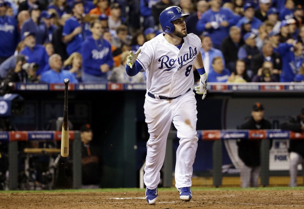 Kansas City Royals' Mike Moustakas hits a home run during the seventh inning of Game 6 of baseball's World Series against the San Francisco Giants Tuesday, Oct. 28, 2014, in Kansas City, Mo. (AP Photo/David J. Phillip)