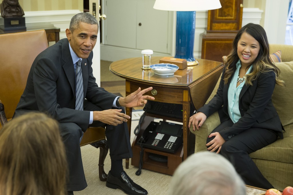 President Barack Obama meets with Ebola survivor Nina Pham in the Oval Office of the White House in Washington, Friday, Oct. 24, 2014.   (AP Photo/Evan Vucci)