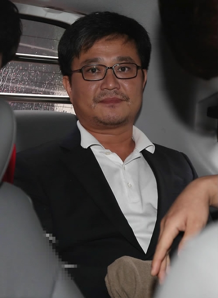 Kim Hyung-sik, a 44-year-old Seoul city councilman, was sentenced to life in prison on Monday. (Yonhap)