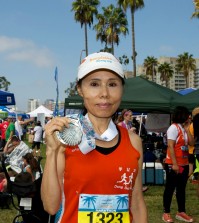 Kathy Joo won the females age 60-64 category at the Long Beach Marathon Sunday.