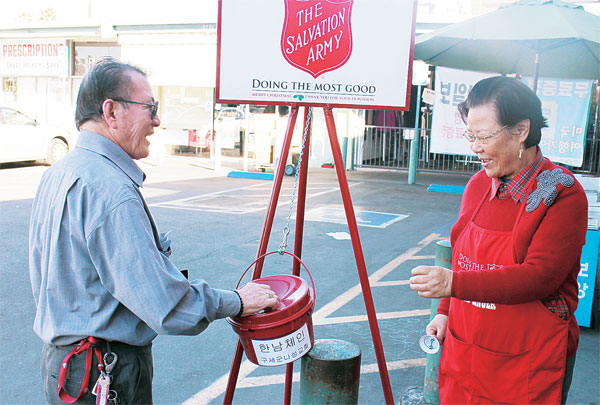A Salvation Army red kettle outside Hannam Chain in Los Angeles' Koreatown.