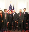 Peter Koo, fourth from left, stands with Korean American community representatives. (The Korea Times)