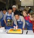 Korean Vincentians and SVDP-LA officials blow out candles on the 20th anniversary cake.