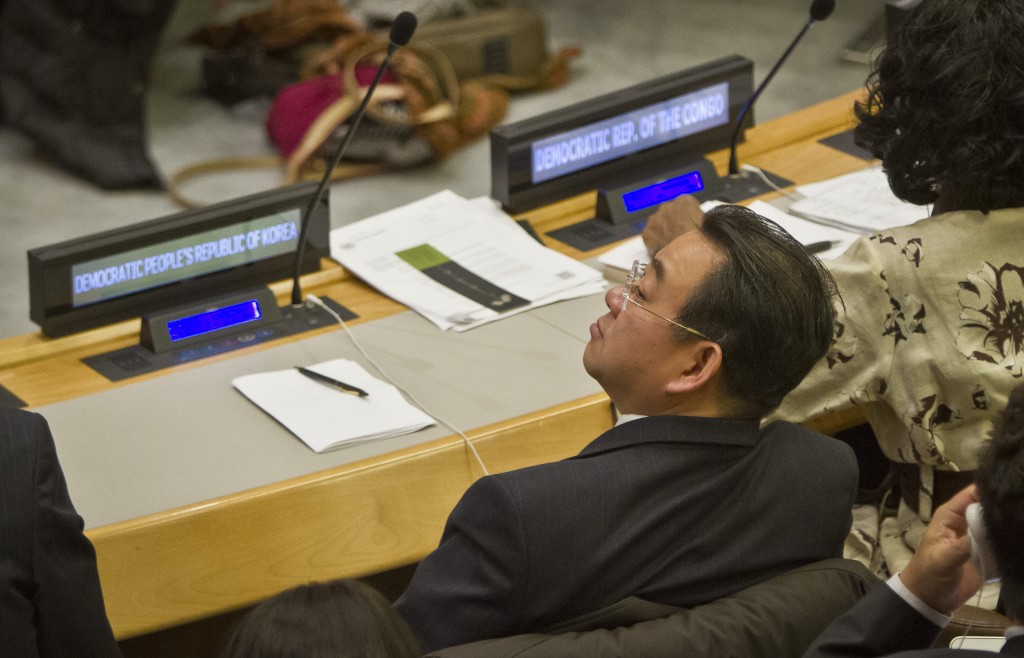 Choe Myong Nam, a North Korean official in charge of U.N. affairs and human rights, listens during a meeting of the U.N. General Assembly human rights committee, Tuesday, Nov. 18, 2014. An attempt to weaken a United Nations move to refer North Korea to the International Criminal Court for alleged crimes against humanity failed Tuesday. (AP Photo/Bebeto Matthews)