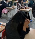 Students wait to take the annual College Scholastic Ability Test at a high school in Seoul on Nov. 13, 2014. (Yonhap)