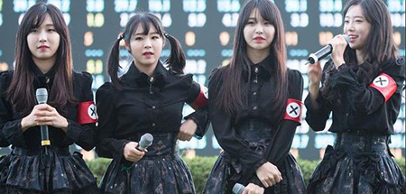 K-pop girl group Pritz is under fire for outfits that resembled Nazi uniforms. (Courtesy of Twitter)