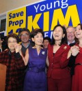Candidates Young Kim, fifth from left, and Michelle Park Steel, second from right, celebrate after their general election victories Tuesday night. (Park Sang-hyuk/The Korea Times)
