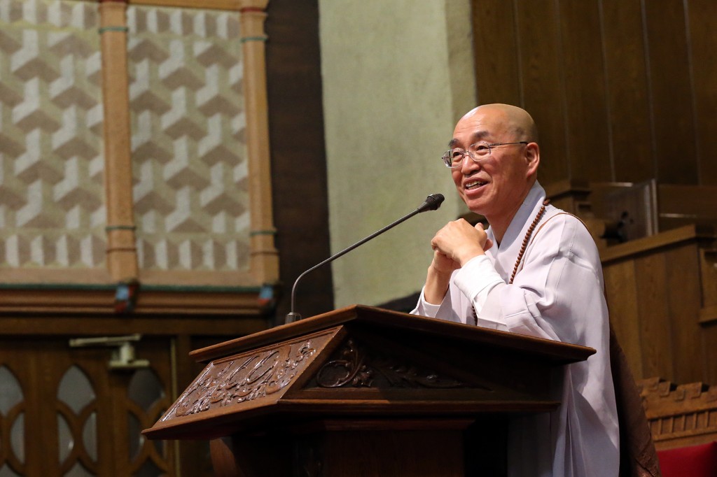 Venerable Pomnyun Sunim speaks inside the Church of Jesus Christ of Latter-day Saints in Koreatown Saturday. 