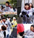 Park Hae-jin hustles with rumormongers delivering briquettes for residents of Guryong village in Seoul. (Yonhap)