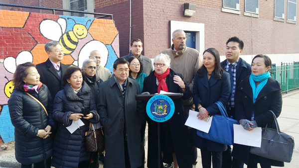 Senator Tony Ann Stavinsky, third from right, speaks at a press conference Thursday about a law that calls for Lunar New Year to be designated a public school holiday.