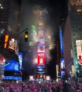 Fireworks erupt after midnight in Times Square during the New Year's Eve celebration, Thursday, Jan. 1, 2015, in New York. Thousands braved the cold to watch the annual ball drop and ring in the new year. (AP Photo/John Minchillo)