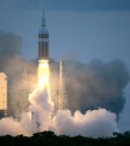 The NASA Orion space capsule atop a Delta IV rocket, in its first unmanned orbital test flight, lifts off from the Space Launch Complex 37B pad at the Cape Canaveral Air Force Station,  Friday, Dec. 5, 2014, in Cape Canaveral, Fla. (AP Photo/John Raoux)