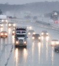 Northbound traffic travels on Interstate 15 near the top of the Cajon Pass near Oak Hills, Calif. on Tuesday, Dec. 2, 2014. Rain saturated the pass and the High Desert but did not cause flooding damage. (AP Photo/Daily Press, James Quigg)