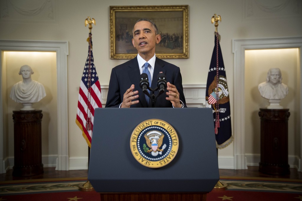 President Barack Obama speaks in the Cabinet Room of the White House in Washington, Wednesday, Dec. 17, 2014, to announce the U.S. will end its outdated approach to Cuba that has failed to advance U.S. interests. (AP Photo/Doug Mills, Pool)