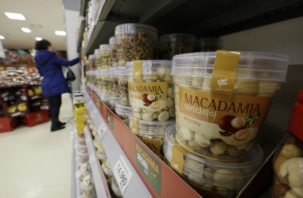 Plastic containers of Macadamia nuts for sale are displayed at a store in Seoul, South Korea, Monday, Dec. 15, 2014. Nut rage imploded the career of a Korean Air Lines executive and embarrassed her family and country. Now South Korean retailers are experiencing the unexpected upside: a boom in sales of macadamias.(AP Photo/Ahn Young-oon)