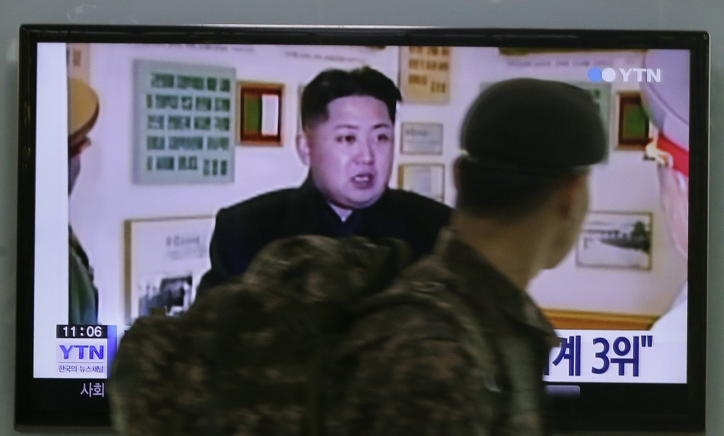 A South Korean army soldier watches aTV news program showing North Korean leader Kim Jong Un at the Seoul Railway Station in Seoul, South Korea, Monday, Dec. 22, 2014.North Korea hates the Hollywood film that revolves around the assassination of its beloved leader, but the country has had a long love affair with cinema _ of its own particular styling.(AP Photo/Ahn Young-joon)