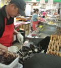 Boongeoppang being made inside a Koreatown market.