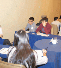 A mentor speaks to students at a joint event held by LOKA and CKA in Washington, D.C., Saturday.