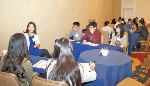 A mentor speaks to students at a joint event held by LOKA and CKA in Washington, D.C., Saturday. 