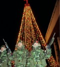 South Korean Marine Corps soldiers stand in front of the Christmas tree at the Kwanghwa Island, west of Seoul near the North Korean border, in December 1996. (AP Photo/Yun Jai-hyoung)