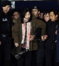 A Korean American Shin Eun-mi, center, arrives at the Incheon International Airport for departure in Incheon, South Korea, Saturday, Jan. 10, 2015.  (Yonhap)