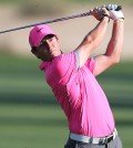 Rory McIlroy of Northern Ireland plays a ball on the16th hole during round two of the Dubai Desert Classic golf tournament in Dubai, United Arab Emirates, Friday, Jan. 30, 2015. (AP Photo/Kamran Jebreili)