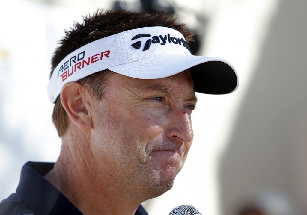 Robert Allenby, of Australia, talks to the media at a practice round for the Phoenix Open golf tournament, Tuesday, Jan. 27, 2015, in Scottsdale, Ariz. (AP Photo/Rick Scuteri)