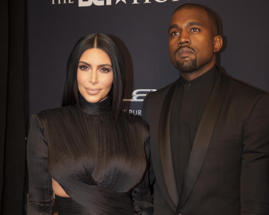 Kim Kardashian and Kanye West arrive on the red carpet at the BET Honors 2015 at Warner Theater on Saturday, Jan. 24, 2015in Washington. (Photo by Kevin Wolf/Invision/AP)
